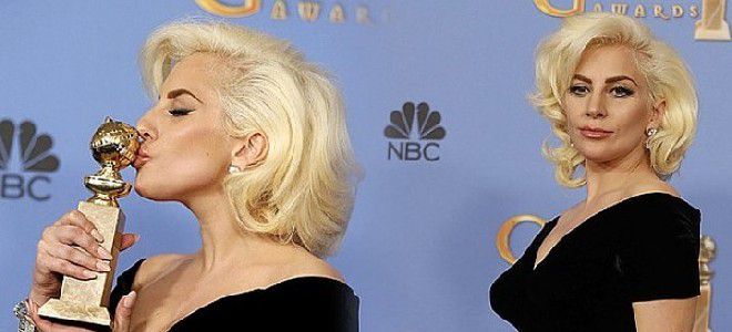 Леди Гага получает награду Золотой Глобус