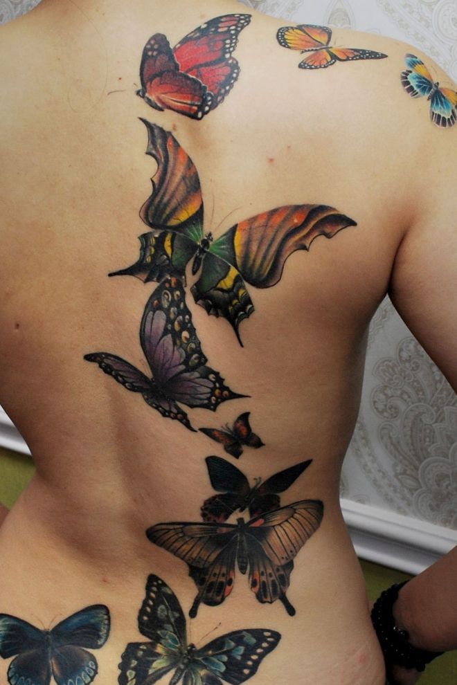 Татуировки бабочки на спине два