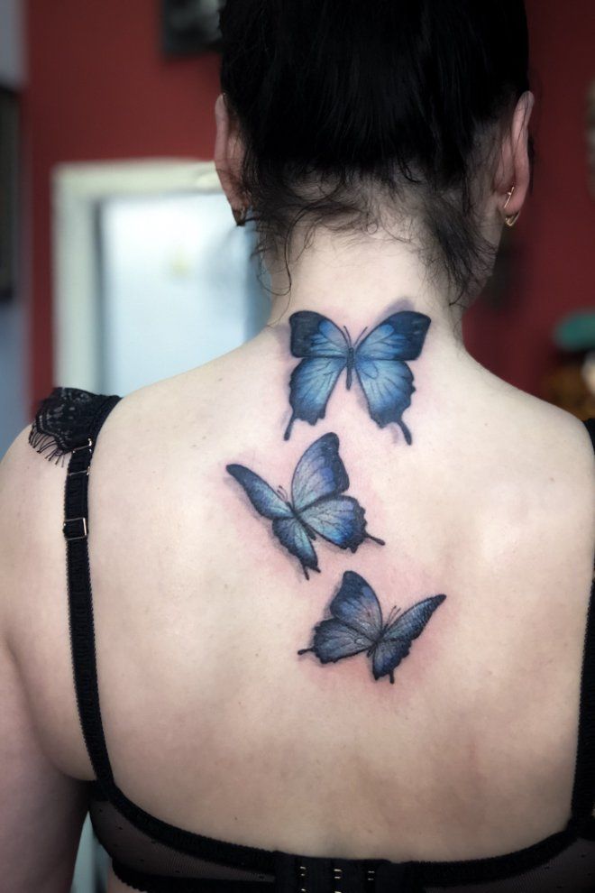 Татуировки бабочки на спине три