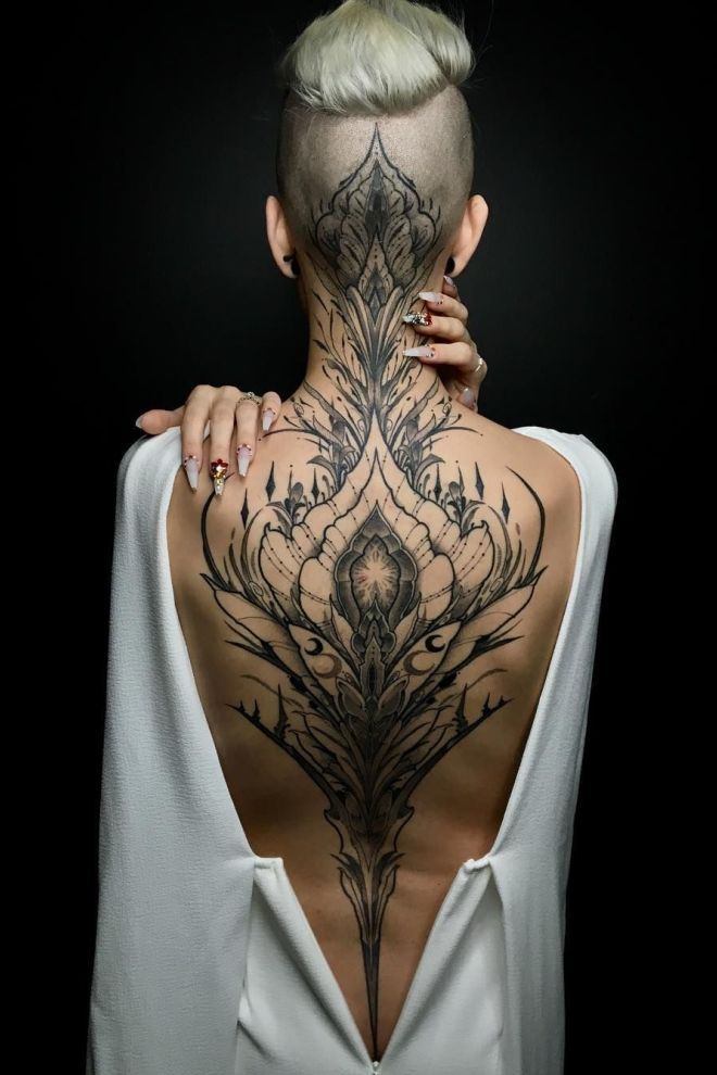 Большие татуировки на спине четыре