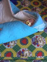 Как завернуть ребенка в одеяло?