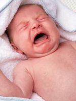 Колики у новорожденных - симптомы