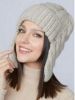 Женская вязаная шапка ушанка - кому идет трендовый аксессуар?