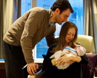 Марк и Челси с дочерью Шарлоттой в сентябре 2014 года