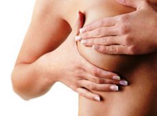почему болит грудь после менструации