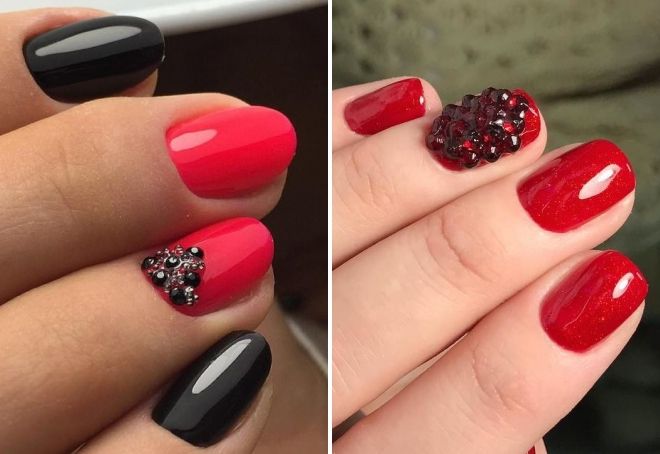 red manicure with black rhinestones