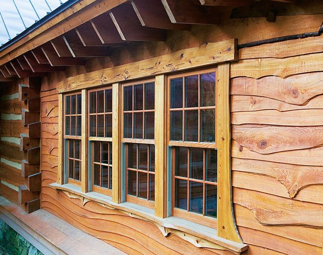 отделка фасада дома деревянными досками