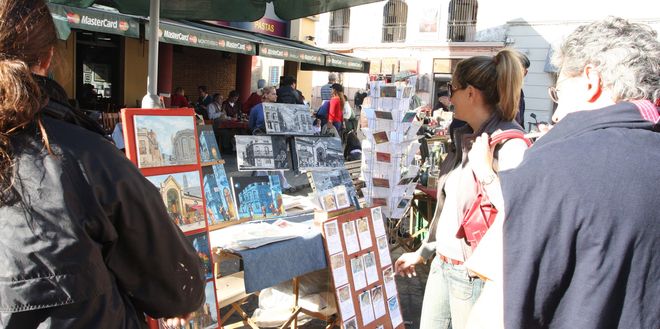 Уличные художники на рынке Меркадо-дель-Пуэрто